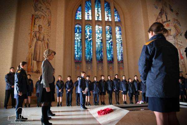 Students laying a wreath in the Hall of Memory