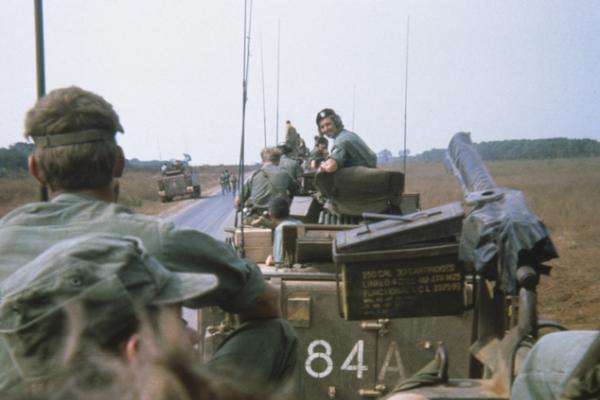Armoured personnel carriers in convoy, South Vietnam, 1971