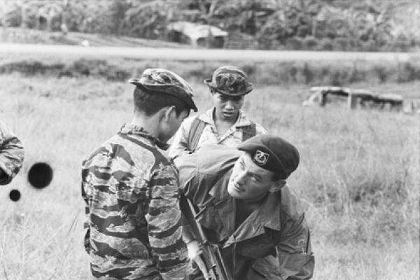Warrant Officer 2 Scowcroft, Australian Army Training Team (AATTV), instructing Montagnard troops, September 1969