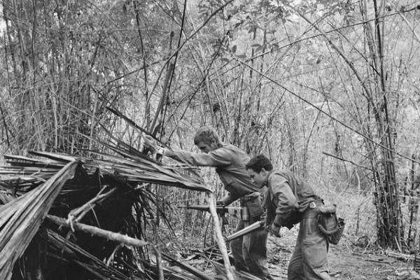 Searching a Viet Cong shelter, Phuoc Tuy province, September 1969