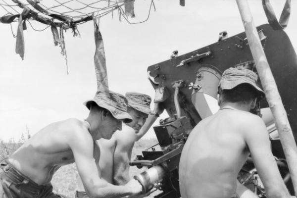 Loading a shell into a 105mm pack howitzer, September 1965