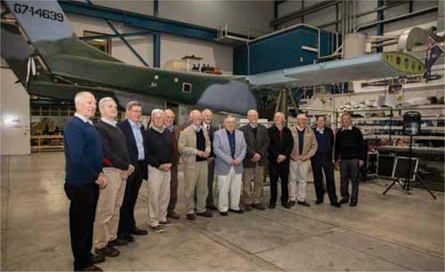 Stakeholders and veterans involved in the restoration of the OV-10A Bronco in the Treloar Technology Centre workshop