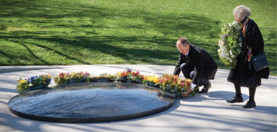 laying wreaths at the dedication of the War correspondents memorial