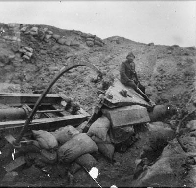 Turkish soldier on a destroyed Krupp heavy coastal artillery gun